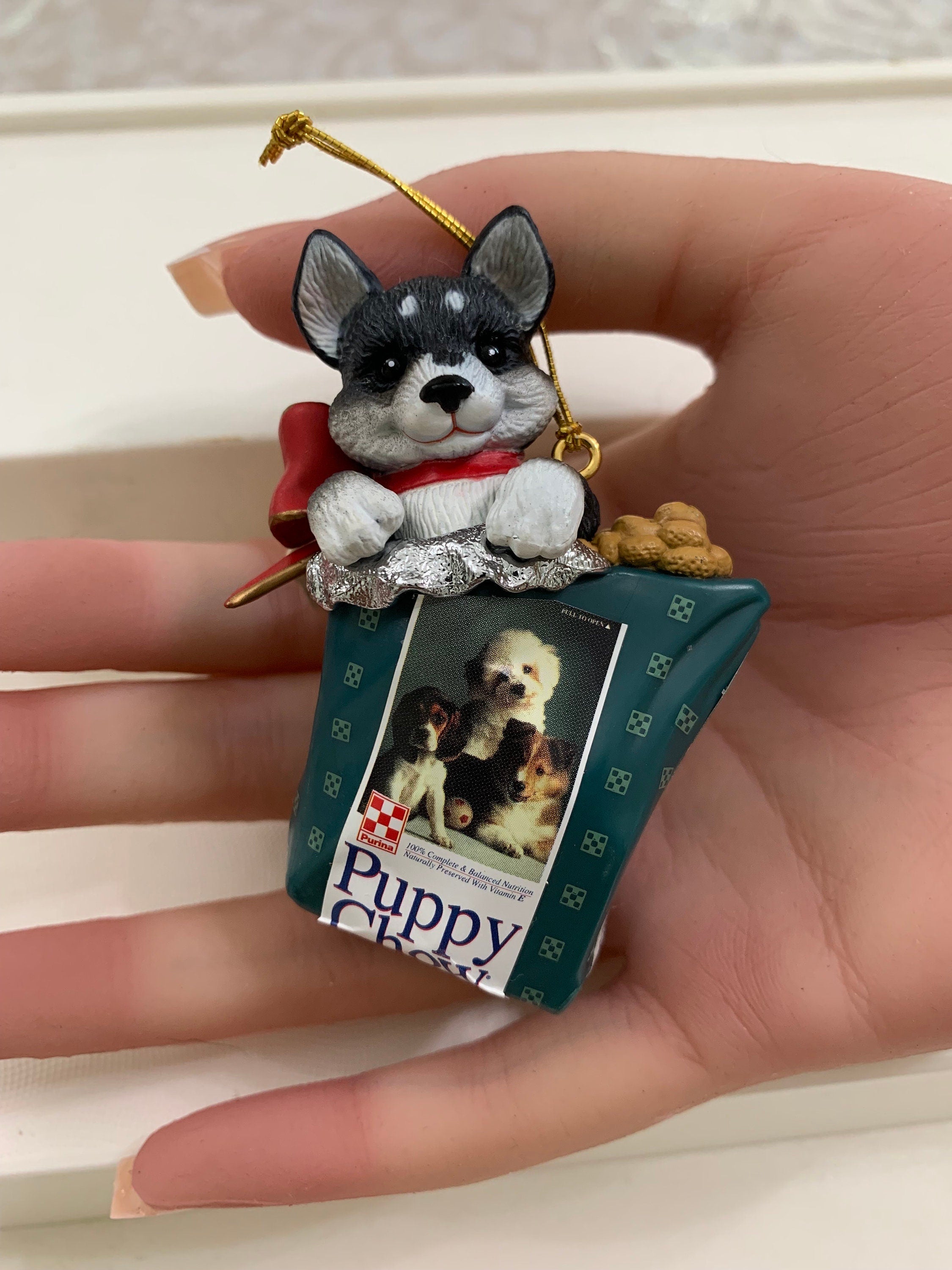 1995 Purina Puppy Chow Ornament by Enesco- Puppy in Dogfood Bag Ornament