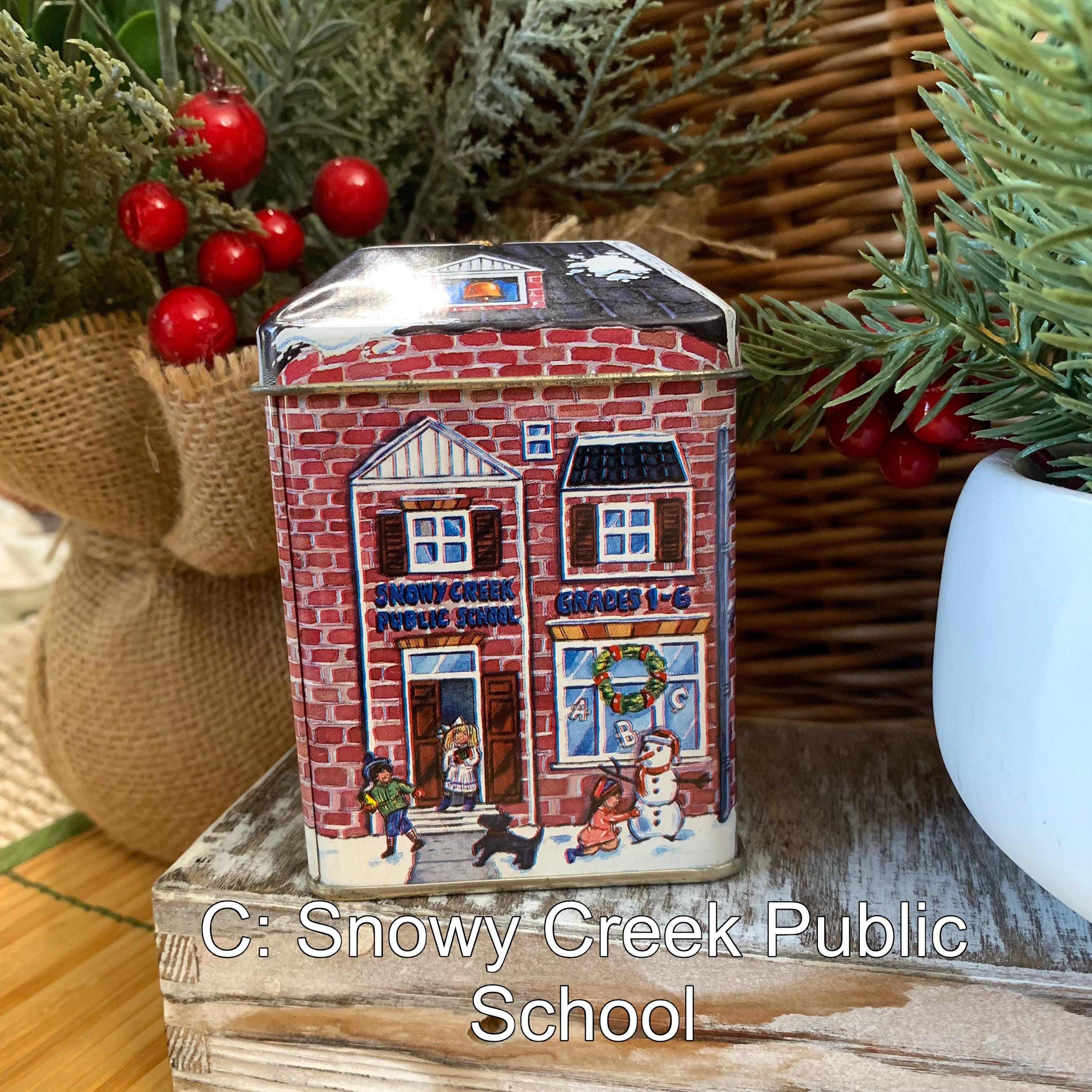 Vintage Tin Box Company Christmas Village Tins – Set of 4 (Toy Store, Snowy Creek Public School, Red Brick Schoolhouse, General Store)