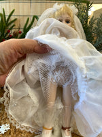Load image into Gallery viewer, Vintage 8” Porcelain Bride Doll - Blonde Curly Hair, Lace Wedding Dress with Veil, Bouquet &amp; Stand - Collectible Wedding Doll
