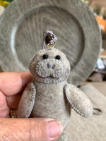 Load image into Gallery viewer, Handmade Felt Manatee Ornament - Car Rearview Mirror or Purse Charm
