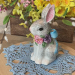 Load and play video in Gallery viewer, Vintage Easter Bunny Figurine with doily
