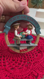 Load and play video in Gallery viewer, 1993 Hallmark Poland Peace On Earth Keepsake Ornament
