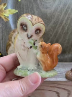 Load and play video in Gallery viewer, Vintage Beswick Beatrix Potter Figurines – Old Mr. Brown Owls with Squirrel – England 1963 – Storybook Animal Pair
