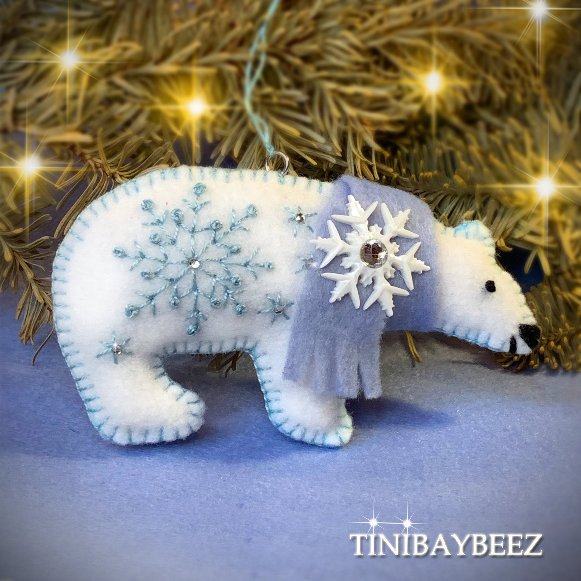 Mini Snowflake Ornaments Embroidered on White Felt With Blue